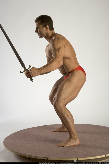 Man Adult Muscular White Fighting with knife Standing poses Underwear