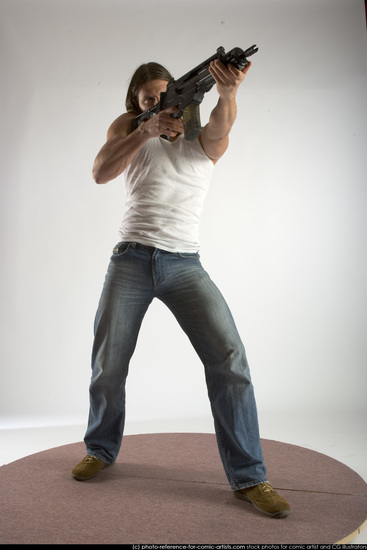 Man Young Muscular White Fighting with submachine gun Standing poses Casual