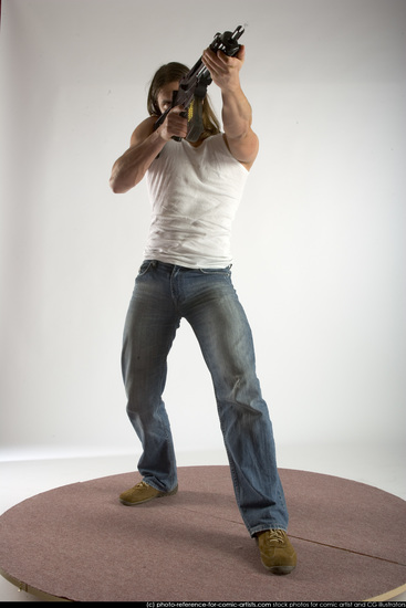 Man Young Muscular White Fighting with submachine gun Standing poses Casual