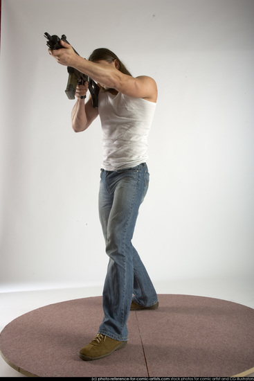 Man Young Muscular White Fighting with submachine gun Standing poses Casual