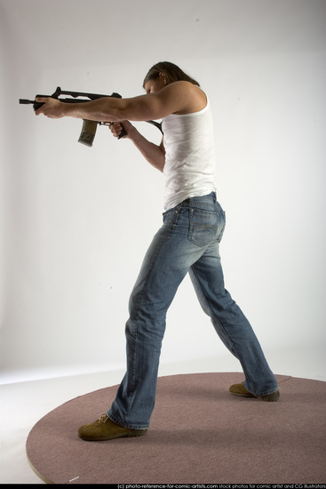 Man Young Muscular White Fighting with submachine gun Standing poses Casual