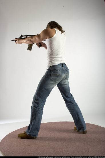 Man Young Muscular White Fighting with submachine gun Standing poses Casual