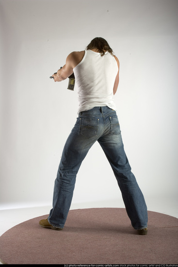 Man Young Muscular White Fighting with submachine gun Standing poses Casual