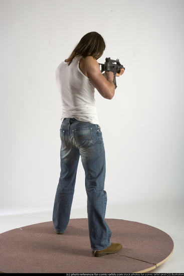 Man Young Muscular White Fighting with submachine gun Standing poses Casual