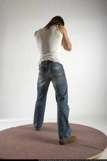 Man Young Muscular White Fighting with submachine gun Standing poses Casual