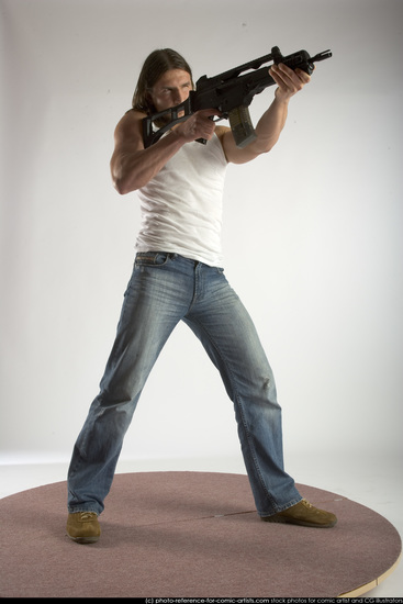 Man Young Muscular White Fighting with submachine gun Standing poses Casual