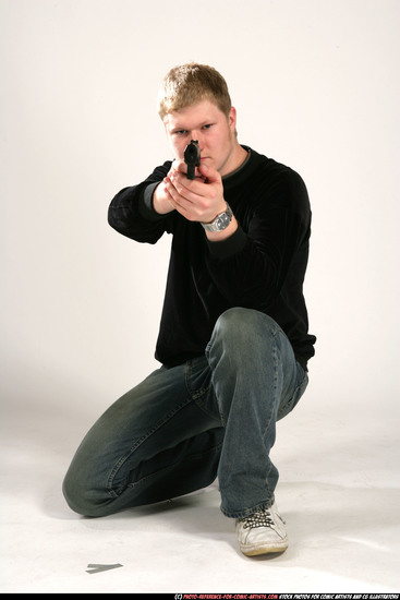 Man Young Chubby White Fighting with gun Kneeling poses Casual