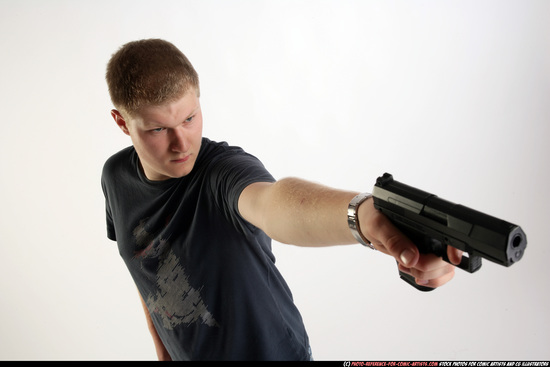 Man Adult Average White Fighting with gun Standing poses Sportswear