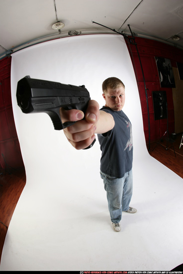 Man Adult Average White Fighting with gun Standing poses Sportswear