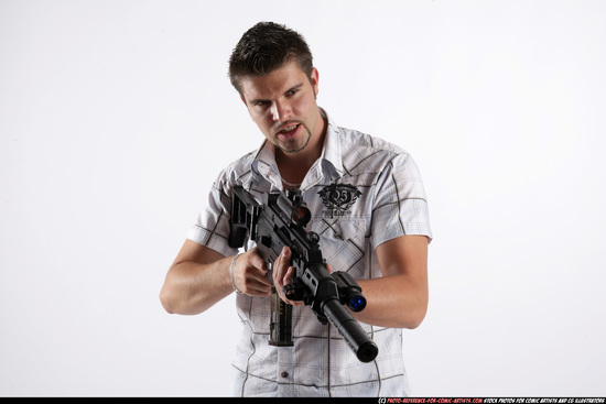 Man Adult Average White Fighting with submachine gun Standing poses Casual