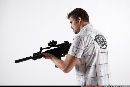 Man Adult Average White Fighting with submachine gun Standing poses Casual