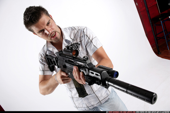 Man Adult Average White Fighting with submachine gun Standing poses Casual