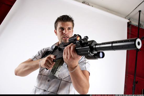 Man Adult Average White Fighting with submachine gun Standing poses Casual