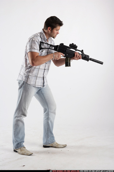 Man Adult Average White Fighting with submachine gun Standing poses Casual