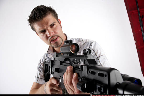 Man Adult Average White Fighting with submachine gun Standing poses Casual