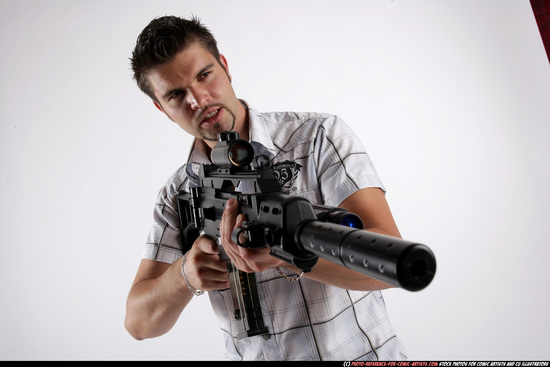 Man Adult Average White Fighting with submachine gun Standing poses Casual