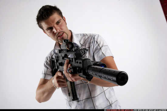 Man Adult Average White Fighting with submachine gun Standing poses Casual