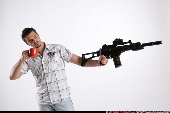 Man Adult Average White Fighting with submachine gun Standing poses Casual