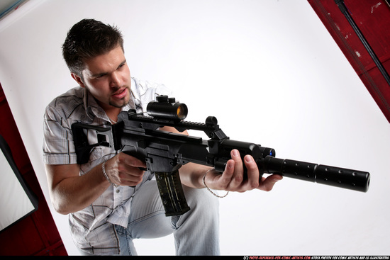 Man Adult Average White Fighting with submachine gun Standing poses Casual