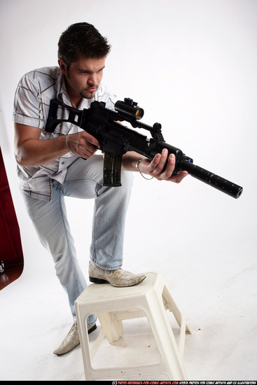 Man Adult Average White Fighting with submachine gun Standing poses Casual