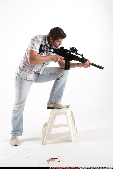 Man Adult Average White Fighting with submachine gun Standing poses Casual