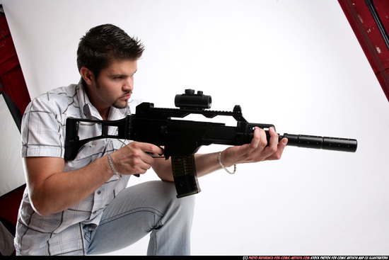 Man Adult Average White Fighting with submachine gun Standing poses Casual