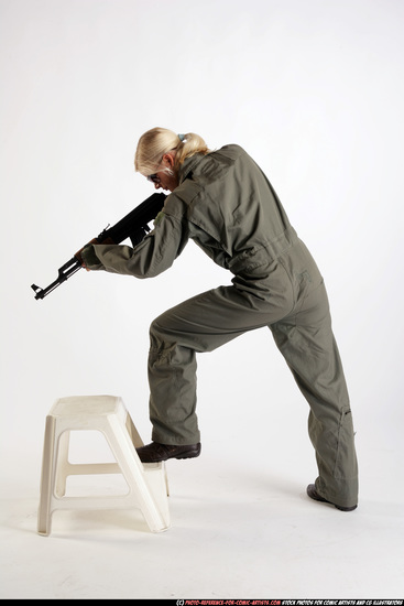 Woman Adult Athletic White Fighting with submachine gun Standing poses Army