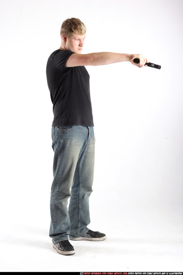 Man Adult Average White Fighting with gun Standing poses Sportswear