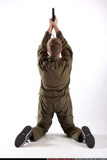 Man Young Average White Fighting with gun Kneeling poses Army