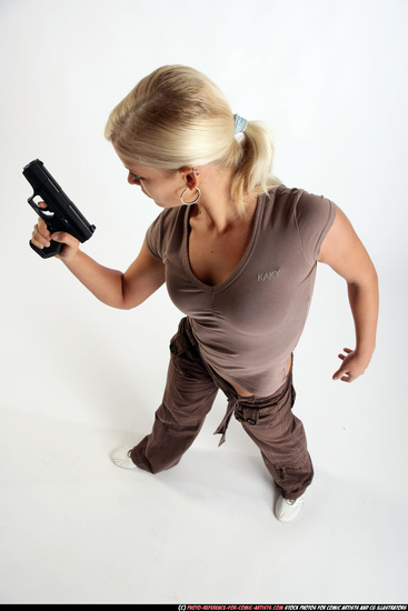 Woman Young Athletic White Fighting with gun Standing poses Sportswear