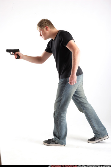 Man Adult Average White Fighting with gun Standing poses Sportswear