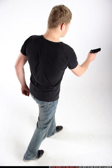 Man Adult Average White Fighting with gun Standing poses Sportswear