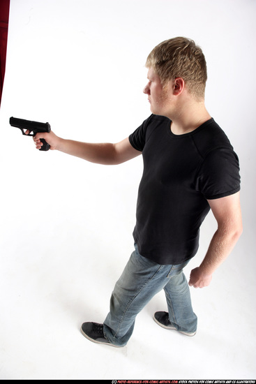 Man Adult Average White Fighting with gun Standing poses Sportswear