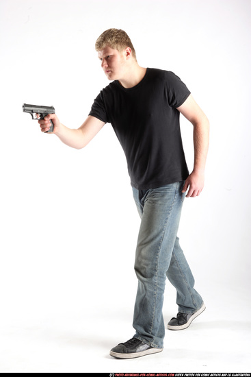 Man Adult Average White Fighting with gun Standing poses Sportswear