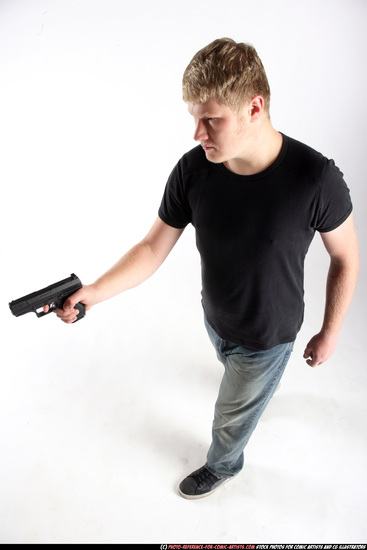 Man Adult Average White Fighting with gun Standing poses Sportswear