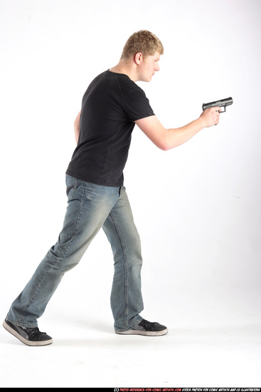 Man Adult Average White Fighting with gun Standing poses Sportswear