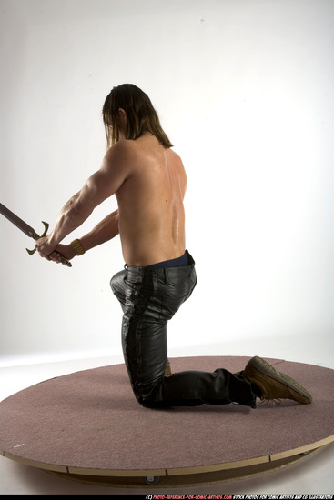 Man Adult Muscular White Fighting with sword Kneeling poses Pants