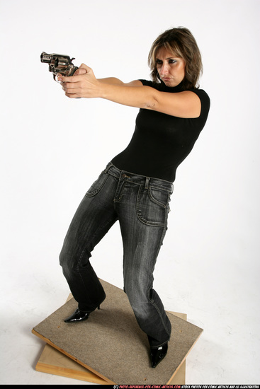 Woman Adult Average White Fighting with gun Standing poses Casual