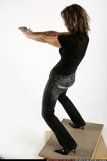 Woman Adult Average White Fighting with gun Standing poses Casual