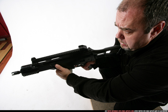 Man Old Chubby White Fighting with submachine gun Kneeling poses Casual