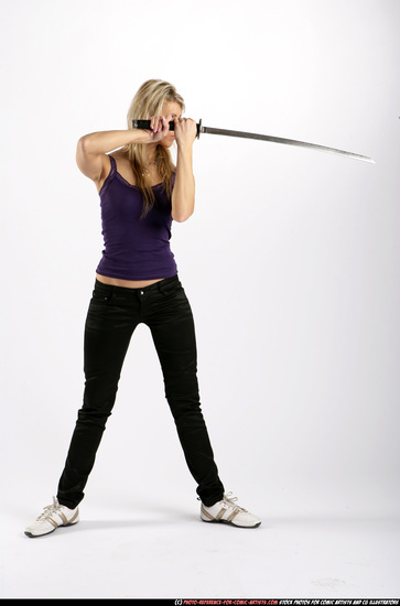 Woman Adult Athletic White Fighting with sword Standing poses Sportswear