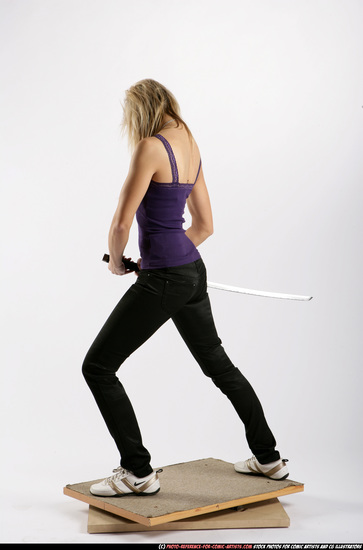 Woman Adult Athletic White Fighting with sword Standing poses Sportswear