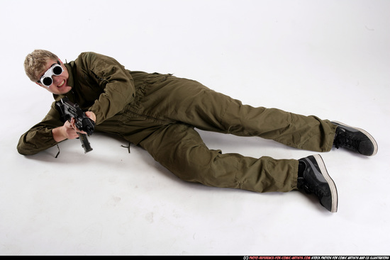 Man Adult Average White Fighting with submachine gun Laying poses Army