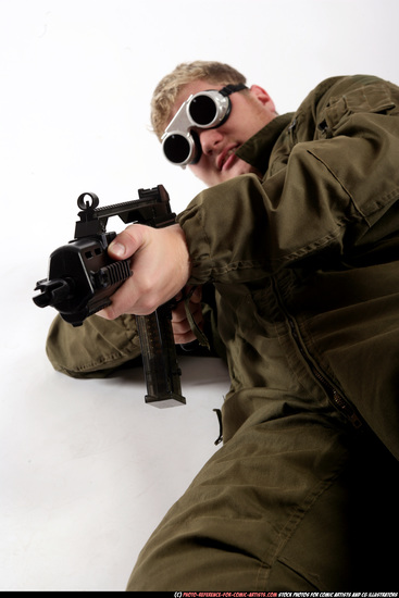 Man Adult Average White Fighting with submachine gun Laying poses Army