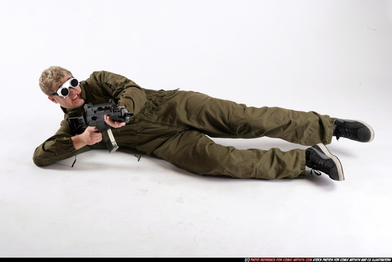 Man Adult Average White Fighting with submachine gun Laying poses Army