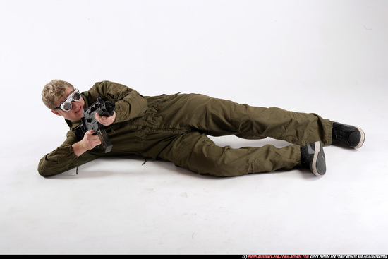 Man Adult Average White Fighting with submachine gun Laying poses Army