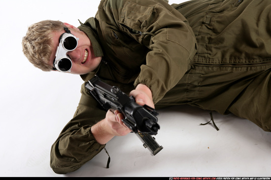 Man Adult Average White Fighting with submachine gun Laying poses Army