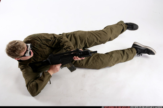 Man Adult Average White Fighting with submachine gun Laying poses Army