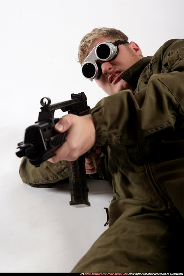 Man Adult Average White Fighting with submachine gun Laying poses Army