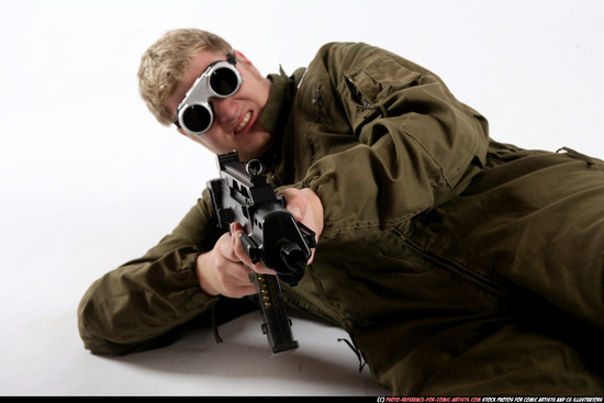 Man Adult Average White Fighting with submachine gun Laying poses Army